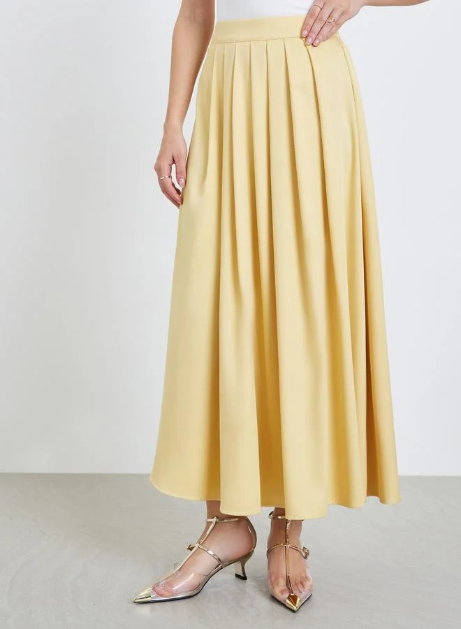 ستايلي تنورة طويلة بطيات صندوقية بقصة واسعة